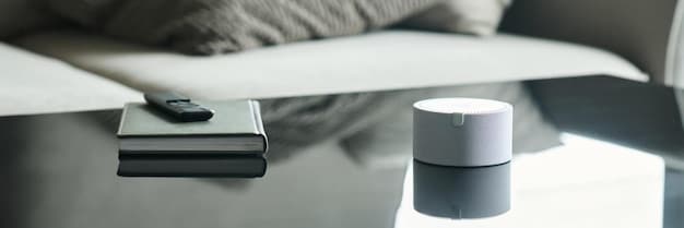 A close-up shot of a smart speaker on a bedside table, showcasing its sleek design and the soft glow of a smart bulb in the background, illustrating the integration of smart home technology in everyday living spaces.
