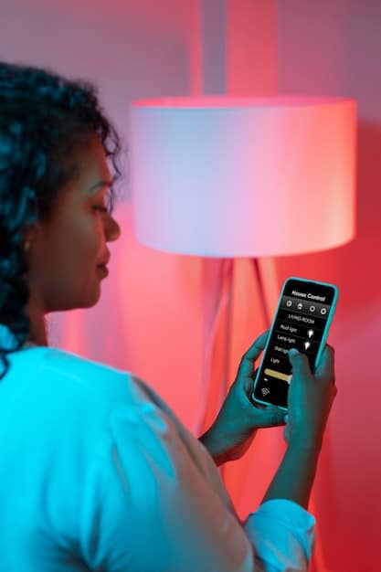 A person using a smartphone app to control the color and brightness of smart light bulbs in their living room. The app interface shows various color options and brightness sliders.