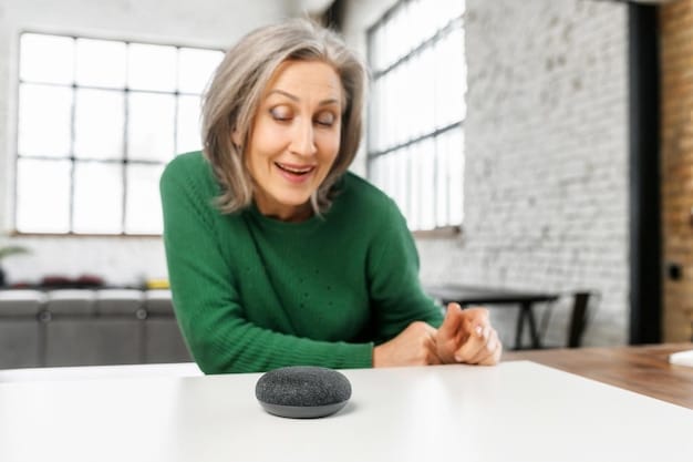 A close-up of a senior woman smiling and interacting with a smart speaker device at her kitchen counter. She is giving a voice command, and the device is responding.