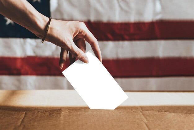 A detailed close-up of a voter's hand placing a ballot into a ballot box, symbolizing the democratic act of voting and the importance of every individual's participation.