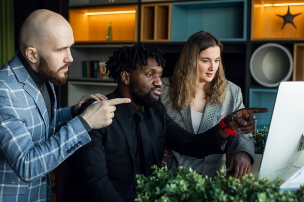 A diverse group of people collaborating on a complex project, using various digital tools to showcase the application of diverse talents in a modern work environment.