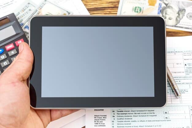 A person's hand interacting with a tablet displaying a salary database website, with various filters and search results. Illustrates the digital access to salary information.