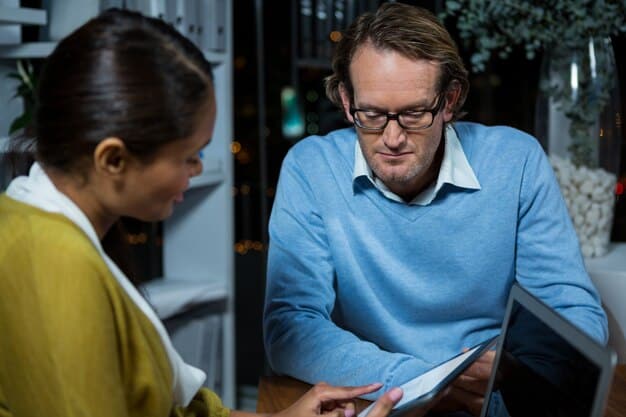 A young professional actively listening and taking notes while an experienced mentor gestures emphatically, explaining a complex concept using a whiteboard in a bright, modern office space. The image conveys active learning and engagement.