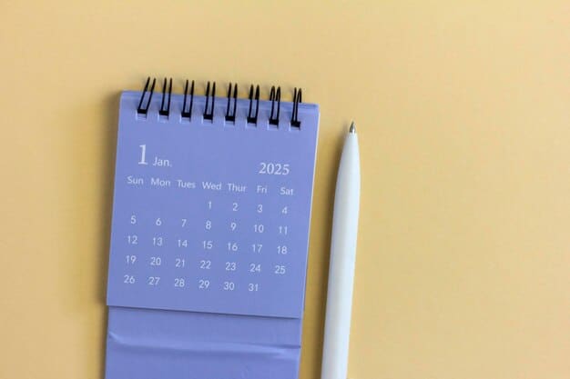A close-up of a hand pointing to a calendar marked