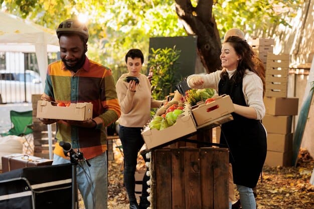 A group of community volunteers sorting fresh produce at a food bank, with shelves of non-perishable goods in the background, representing community support and food distribution efforts.