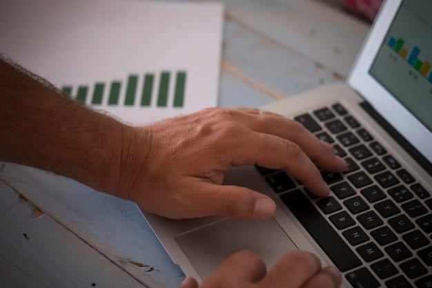 A detailed close-up of hands typing on a laptop, with financial charts and graphs visible on the screen, indicating in-depth analysis and strategic planning.