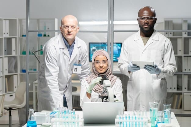 A diverse group of scientists in a modern laboratory, collaborating around advanced genetic sequencing equipment, representing interdisciplinary cancer research efforts.