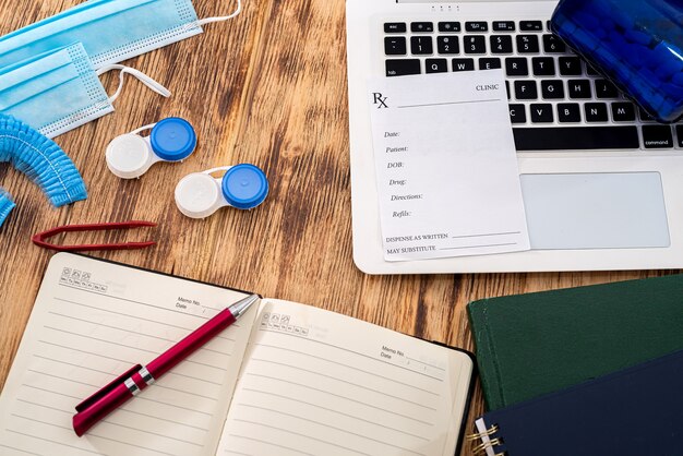A neatly organized desk with medical records, a stack of papers, a pen, and a calendar, emphasizing the importance of detailed organization and timely submission for a health insurance appeal.