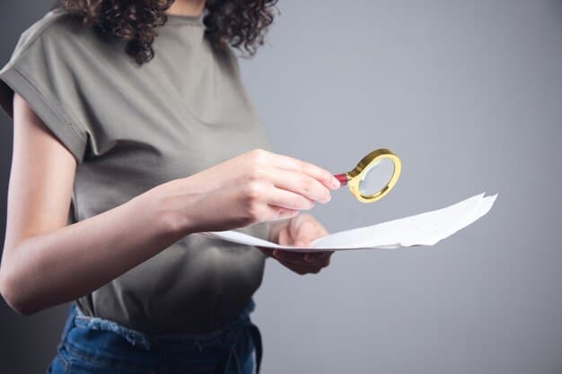 A magnifying glass hovering over detailed policy documents, with a hand pointing to a specific clause, symbolizing careful review and detailed understanding.