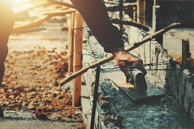 A close-up image of construction workers repairing a section of an old, cracked highway bridge. Heavy machinery is in the background, and the workers are wearing safety vests and helmets. The image captures the essence of infrastructure repair and the labor involved in upgrading existing structures under the New Legislation Alert: Congress Passes Bill to Modernize US Infrastructure - Key Provisions.