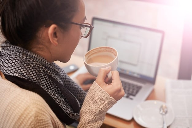 A person (gender neutral) meticulously editing a resume on a laptop, with a mind map or concept cloud showing connections between their past experience and a new industry. Coffee mug visible.
