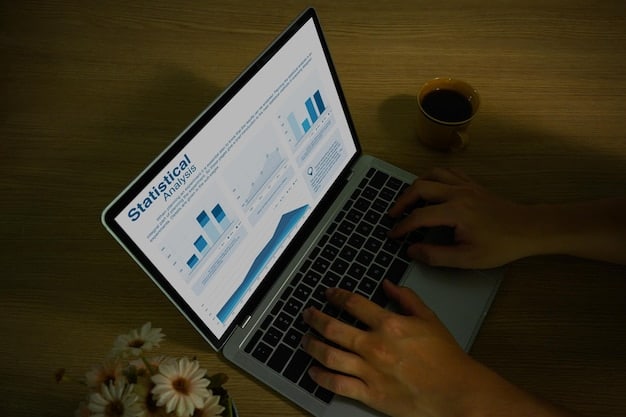 A person using a laptop to research salary data on a website, with charts and graphs visible on the screen. The image highlights the importance of data-driven research in salary negotiation.