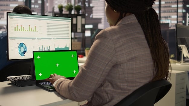 A person using a laptop to research government assistance programs, with charts and data visible on the screen. The image represents the importance of staying informed about potential expansions and eligibility requirements for programs like Are You Eligible? New Expansions to US Government Assistance Programs in 2025.