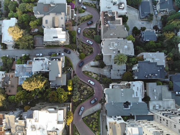 An aerial view of a mixed-income neighborhood with a variety of housing types, including single-family homes, townhouses, and apartment buildings. The image represents the housing choices available to families through the Section 8 voucher program. The words 