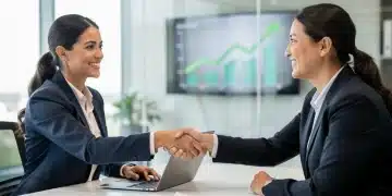 Professional woman shaking hands, symbolizing successful salary negotiation for a 15% increase in 2026.