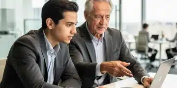 Mentor and mentee discussing career strategies in a modern office, symbolizing professional guidance and growth.